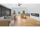 Beautiful living room featuring a fireplace, pool table and comfortable seating area at 103 Maddox Rd, Buford, GA 30518