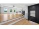 Stylish living room featuring a fireplace and hardwood floors at 103 Maddox Rd, Buford, GA 30518