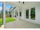 Covered patio featuring white brick columns and a view of the backyard at 103 Maddox Rd, Buford, GA 30518