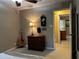Bedroom view featuring an ornate chest of drawers, guitar, and doorway to another room at 3474 Leaf Land Ct, Duluth, GA 30097