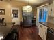 Modern kitchen with stainless steel appliances, a granite-topped bar, and ample natural light for a bright, airy atmosphere at 3474 Leaf Land Ct, Duluth, GA 30097