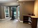 Inviting living room with tiled flooring, bay windows and natural light, offering a comfortable atmosphere at 3474 Leaf Land Ct, Duluth, GA 30097