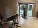 Bright living room features tiled flooring, large windows, and ample space for recreation and relaxation at 3474 Leaf Land Ct, Duluth, GA 30097