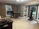 Comfortable living room with tiled flooring, ideal for recreation, music, and relaxation with great natural lighting at 3474 Leaf Land Ct, Duluth, GA 30097