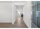 Bright entryway features wood floors, neutral walls, and view to living room at 4778 Moonstone Trce, Kennesaw, GA 30144
