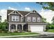 New two story home features a welcoming porch and attached two car garage at 4778 Moonstone Trce, Kennesaw, GA 30144