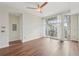 Spacious bedroom with large windows and a ceiling fan at 711 Cosmopolitan Ne Dr # 802, Atlanta, GA 30324