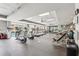 Well-equipped gym with treadmills, weights, and large windows overlooking the pool at 711 Cosmopolitan Ne Dr # 802, Atlanta, GA 30324