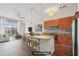 Bright, open kitchen featuring granite countertops, stainless steel appliances, and a large island with bar seating at 711 Cosmopolitan Ne Dr # 802, Atlanta, GA 30324