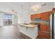 Bright kitchen featuring granite countertops, stainless steel appliances, and a large island at 711 Cosmopolitan Ne Dr # 802, Atlanta, GA 30324