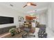 Open-concept living room featuring a kitchen, and dining area at 711 Cosmopolitan Ne Dr # 802, Atlanta, GA 30324