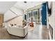 Modern lobby with a large picture window, elegant seating, and a fireplace at 711 Cosmopolitan Ne Dr # 802, Atlanta, GA 30324