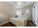 Cozy bedroom features hardwood floors, neutral walls, and a ceiling fan at 2811 Alpine Ne Rd, Atlanta, GA 30305
