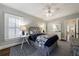 Comfortable bedroom with a ceiling fan, shuttered windows, and neutral colored walls at 2811 Alpine Ne Rd, Atlanta, GA 30305