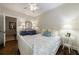 Bedroom with hardwood floors, a ceiling fan, and a view into another room at 2811 Alpine Ne Rd, Atlanta, GA 30305