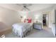 Bedroom with a ceiling fan, pink decor, and neutral carpet at 2811 Alpine Ne Rd, Atlanta, GA 30305