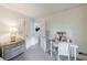 Bright bedroom with a dresser, desk, and access to a closet at 2811 Alpine Ne Rd, Atlanta, GA 30305