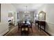 Traditional dining room featuring a chandelier, dining table, and area rug at 2811 Alpine Ne Rd, Atlanta, GA 30305