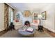 Cozy living area with decorative fireplace, inviting armchairs and hardwood floors at 2811 Alpine Ne Rd, Atlanta, GA 30305