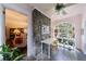 Sunroom with stone accent wall, lots of natural light and views to the outdoors at 2811 Alpine Ne Rd, Atlanta, GA 30305