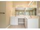 Bright bathroom featuring double sinks and plenty of counter space at 412 Middlebrooke St, Canton, GA 30115
