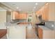 Spacious kitchen featuring granite countertops, modern appliances, and ample cabinet space at 412 Middlebrooke St, Canton, GA 30115