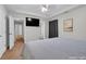 A large bedroom includes recessed lights and a TV at 5807 Mitchell Chase Trl, Mableton, GA 30126