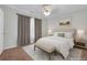 A serene bedroom boasts neutral tones, soft carpet, and ample natural light at 5807 Mitchell Chase Trl, Mableton, GA 30126