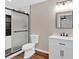 Clean bathroom featuring modern tile, glass shower, sink with vanity, and updated fixtures at 161 Old Vandiver Dr, Canton, GA 30114
