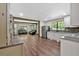 Bright and open kitchen featuring stainless steel appliances, granite counters, and an open concept floor plan at 161 Old Vandiver Dr, Canton, GA 30114