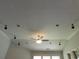 Detailed ceiling with recessed lights and a ceiling fan in the middle at 330 La Perla Dr, Sugar Hill, GA 30518