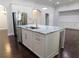 Kitchen island with stainless steel appliances and granite countertops at 330 La Perla Dr, Sugar Hill, GA 30518