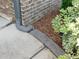 Well maintained landscaping around home's foundation with stone border and mulch at 330 La Perla Dr, Sugar Hill, GA 30518