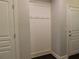 Mudroom with white hall tree, offering hooks for coats and bags by the entrance at 330 La Perla Dr, Sugar Hill, GA 30518