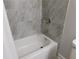Close-up of bathroom shower with tiled walls and modern fixtures at 330 La Perla Dr, Sugar Hill, GA 30518