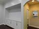 Built-in storage cabinets providing ample space for organization, and entry to another room at 330 La Perla Dr, Sugar Hill, GA 30518