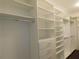 Bright and well-organized walk-in closet at 330 La Perla Dr, Sugar Hill, GA 30518