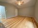 Spacious bedroom with hardwood floors and neutral walls, offering a blank canvas for personal style at 48 Glenhaven Ct, Douglasville, GA 30134