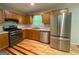 Well-appointed kitchen featuring stainless steel appliances and ample cabinet space, ready for culinary adventures at 48 Glenhaven Ct, Douglasville, GA 30134
