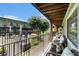 Relaxing balcony with outdoor seating overlooking a beautifully landscaped courtyard and community space at 1705 Monroe Ne Dr # E3, Atlanta, GA 30324