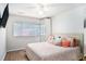 Cozy bedroom featuring a comfortable bed and a wall-mounted TV for relaxing at 1705 Monroe Ne Dr # E3, Atlanta, GA 30324