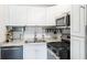 Well-equipped kitchen features modern appliances and ample counter space at 1705 Monroe Ne Dr # E3, Atlanta, GA 30324