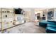 Bright living room offering open layout, modern decor, and stainless steel kitchen appliances at 1705 Monroe Ne Dr # E3, Atlanta, GA 30324