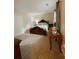 Bedroom features a wooden bed frame and carpeted floors for a cozy feel at 287 Willow Cove Ct, Lawrenceville, GA 30044