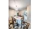 Dining room features chandelier, and view to staircase at 287 Willow Cove Ct, Lawrenceville, GA 30044
