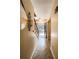View of the hallway with modern lighting and stairwell at 287 Willow Cove Ct, Lawrenceville, GA 30044