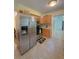 Bright kitchen featuring stainless steel appliances, tile floors and granite countertops at 287 Willow Cove Ct, Lawrenceville, GA 30044