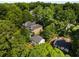 A high aerial view of the home showcasing lush surroundings and neighborhood at 3158 Granby Ave, Scottdale, GA 30079