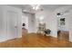 Bright and spacious living room with hardwood floors and adjacent bedrooms at 3158 Granby Ave, Scottdale, GA 30079
