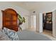 Bedroom with a large wardrobe, walk-in closet, light hardwood floors, and bright, neutral paint at 3777 Peachtree Ne Rd # 1227, Brookhaven, GA 30319